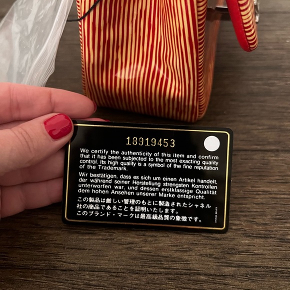 CHANEL
Red/White Striped Patent Leather Classic Mini Flap Bag - Picture 4 of 8